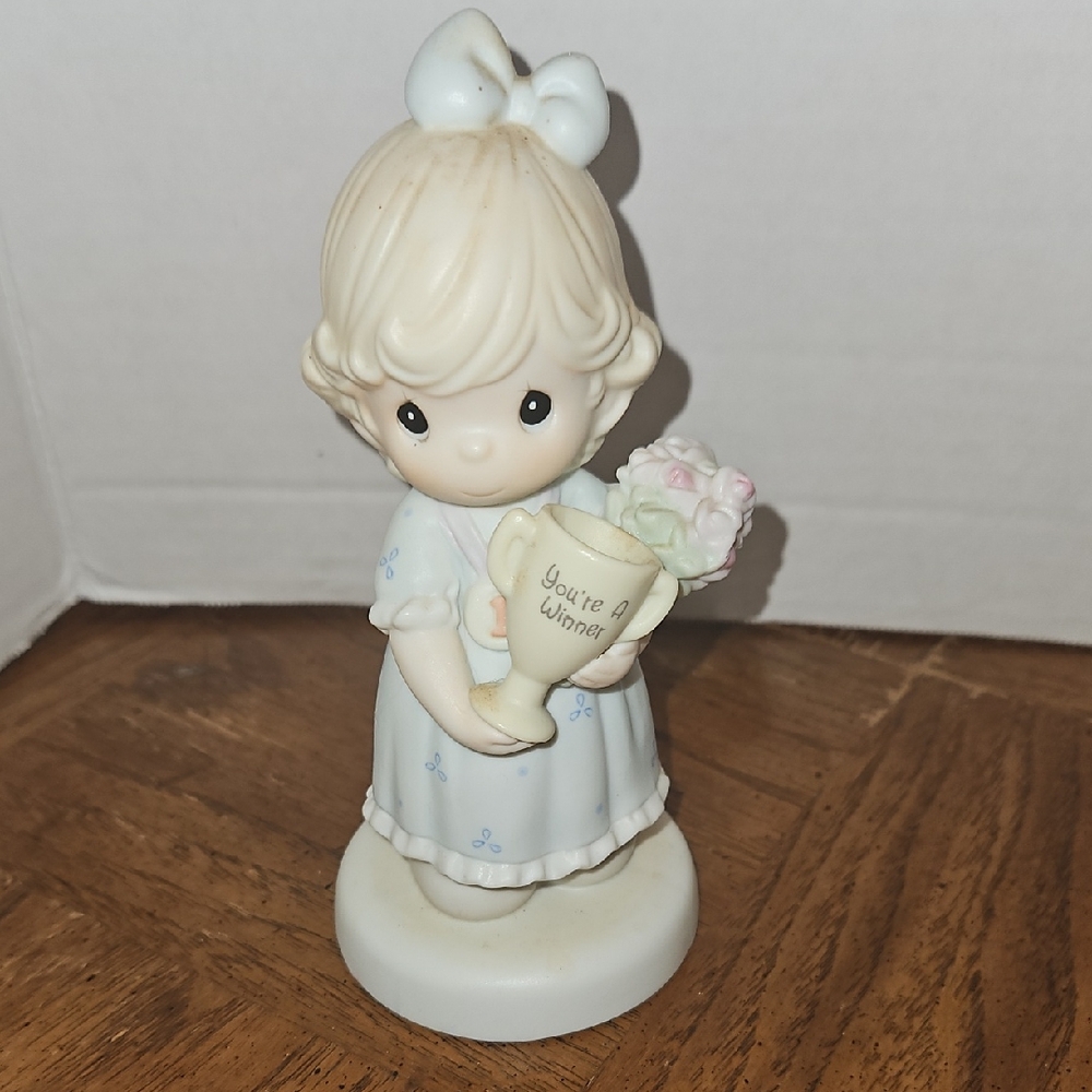 Precious Moments Cream and Pastel Blue 'You're A Winner' Girl Figurine